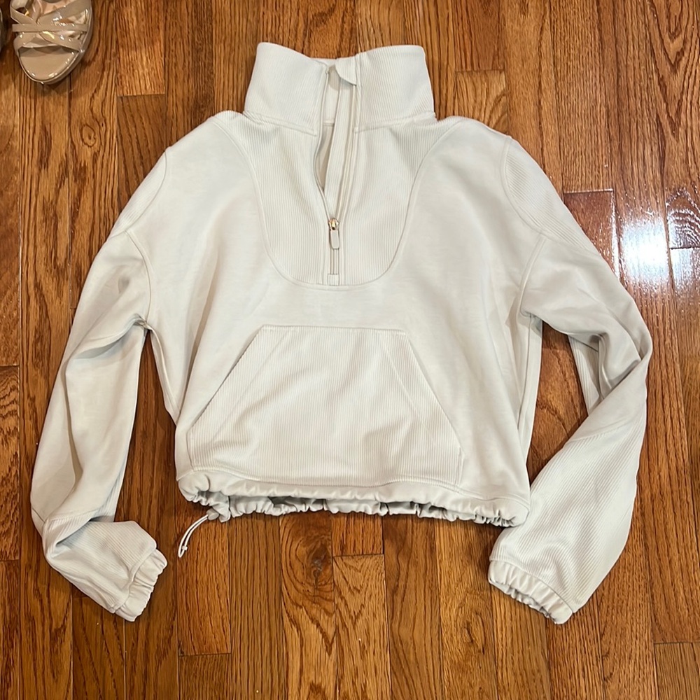 Very soft Lululemon cream size 4 quarter zip